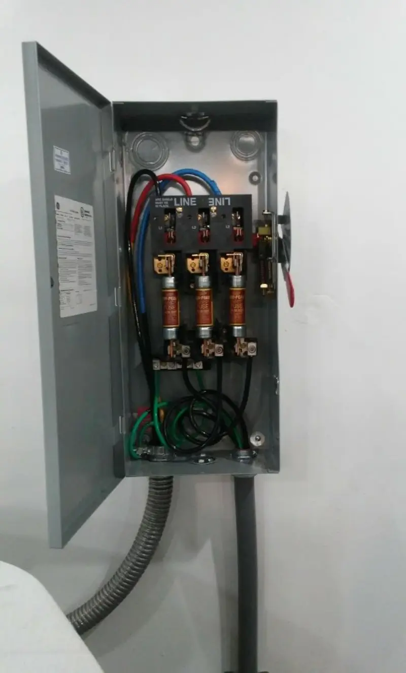 Three-phase disconnect switch installed for Smoke Detector Installation in West Liberty
